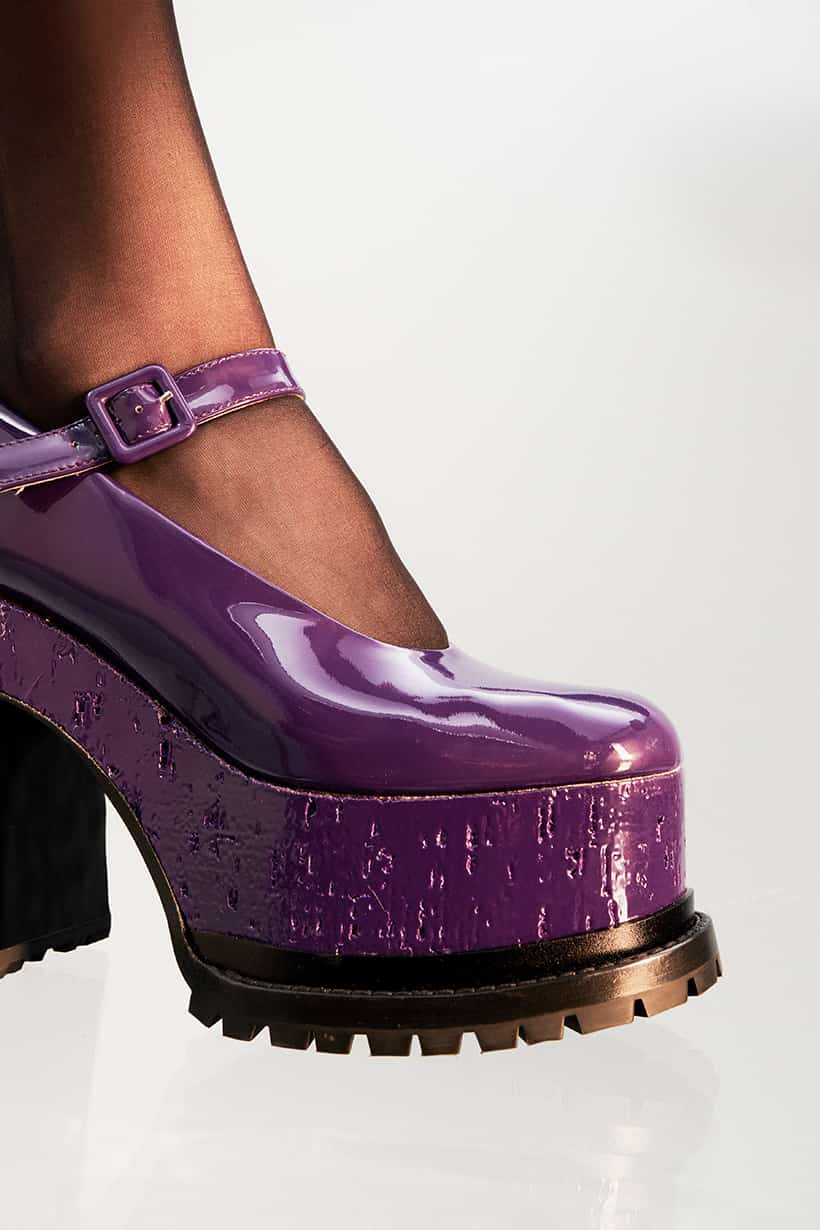 Close-up of Lacquer Doll purple patent mary janes