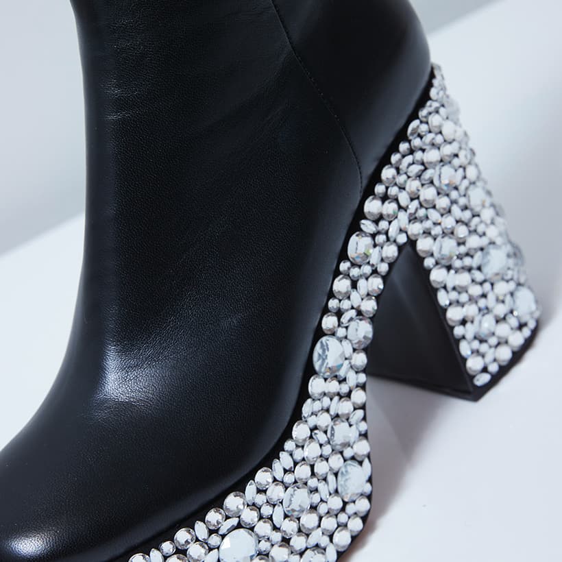 Close-up of Croco Crystal ankle boot in black