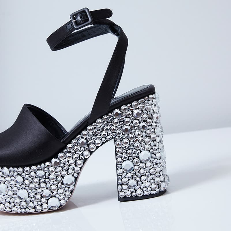 Close-up of Croco Crystal sandal in black