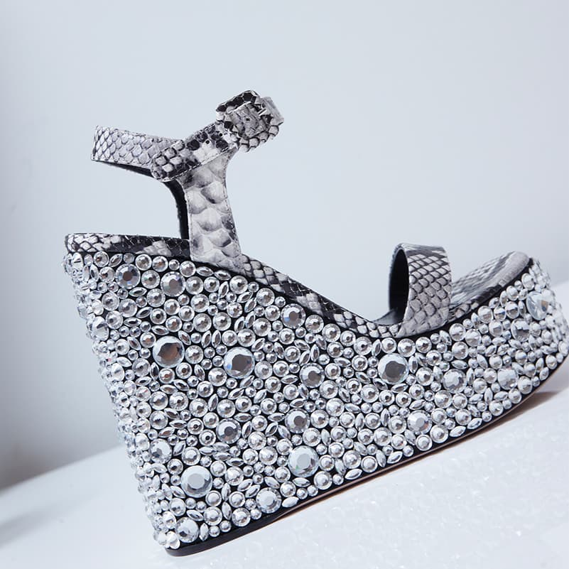 Close-up of Croco Crystal sandal in python with wedge heel