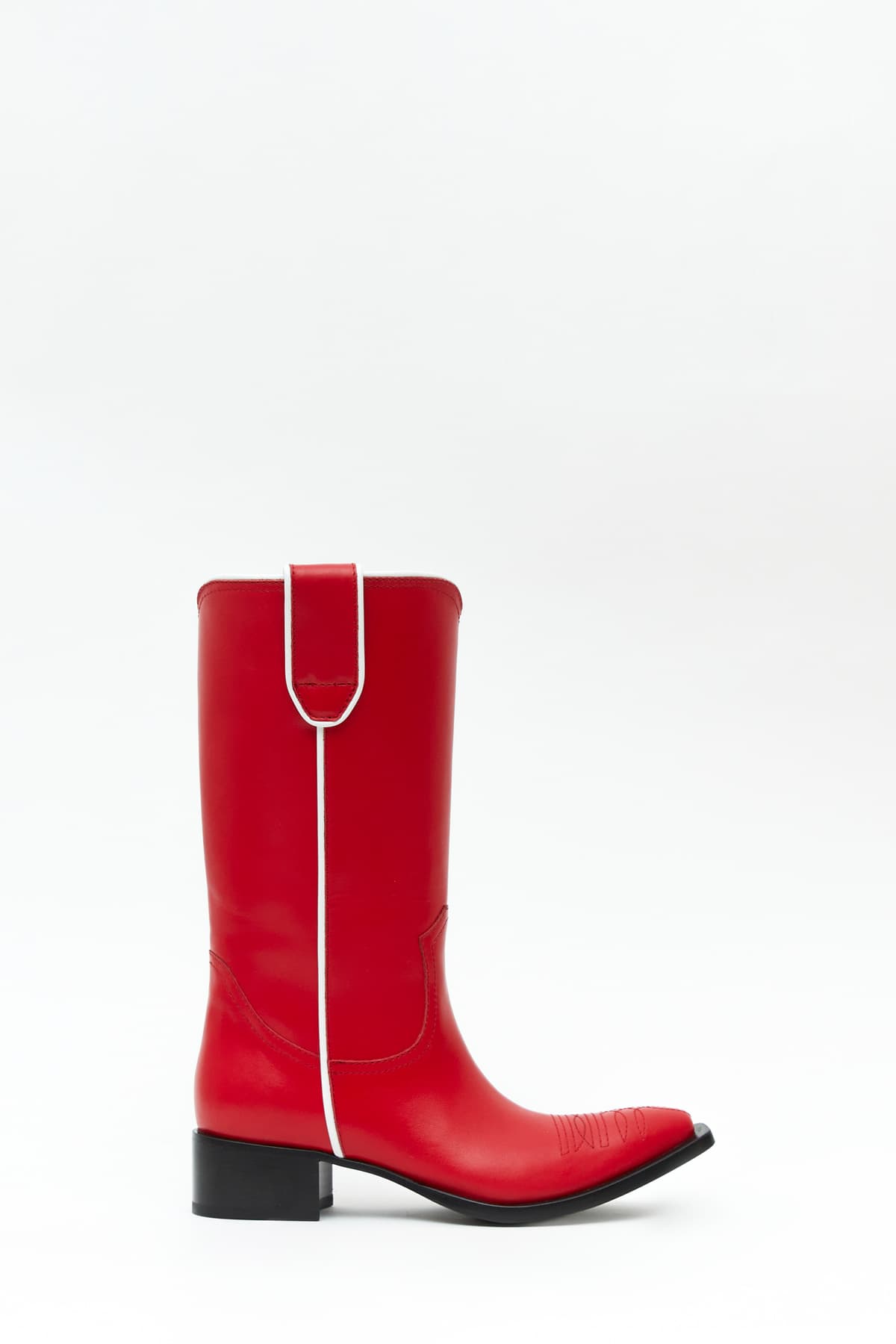 Sideview of Taxhoney boot in red from the Haus of Honey fall-winter 2023-24